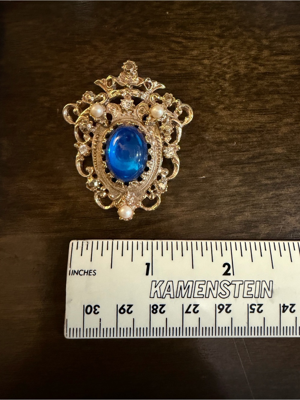 Vintage-Inspired Gold Brooch with Blue Cabochon and Pearls